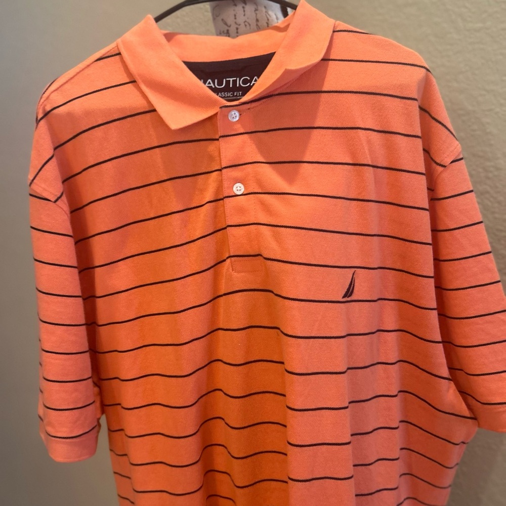 Nautica Men's Polo in Orange with Stripes.